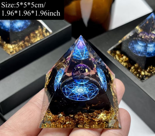 Handcrafted dream orgone pyramid with natural obsidian stones