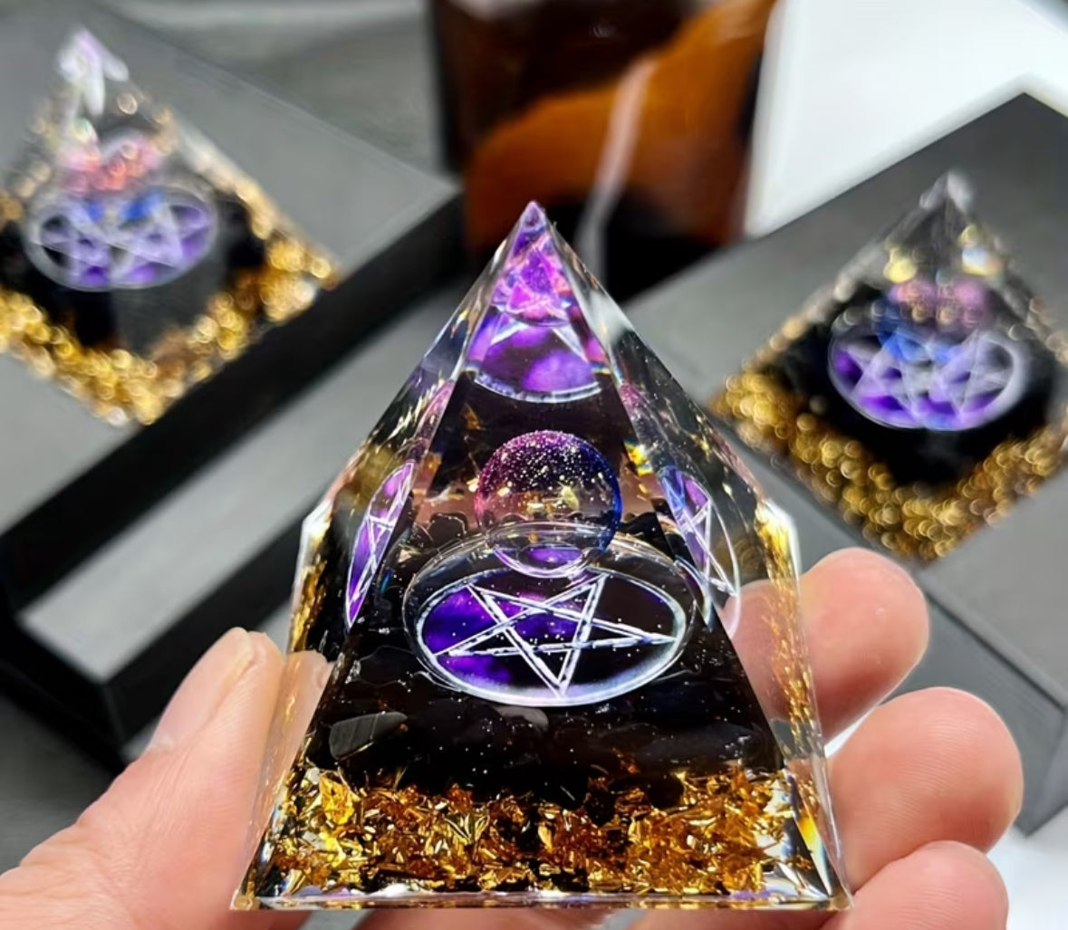 Handcrafted dream orgone pyramid with natural obsidian stones